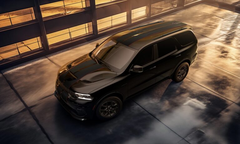 2026 Dodge Durango R/T Plus (shown in Diamond Black exterior color) with new Blacktop Redline package and optional Redline Red & Black dual stripes exclusive to the Blacktop Redline package.