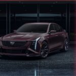 Front 3/4 view of the Curated by Cadillac 2026 Cadillac CT5-V Blackwing in Deep Amethyst Metallic exterior paint color.