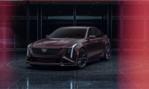 Front 3/4 view of the Curated by Cadillac 2026 Cadillac CT5-V Blackwing in Deep Amethyst Metallic exterior paint color.