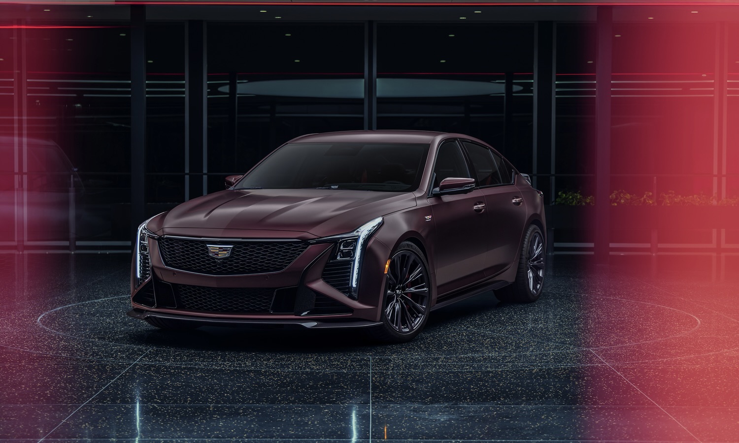 Front 3/4 view of the Curated by Cadillac 2026 Cadillac CT5-V Blackwing in Deep Amethyst Metallic exterior paint color.