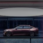Side view of the Curated by Cadillac 2026 Cadillac CT5-V Blackwing in Deep Amethyst Metallic exterior paint color.