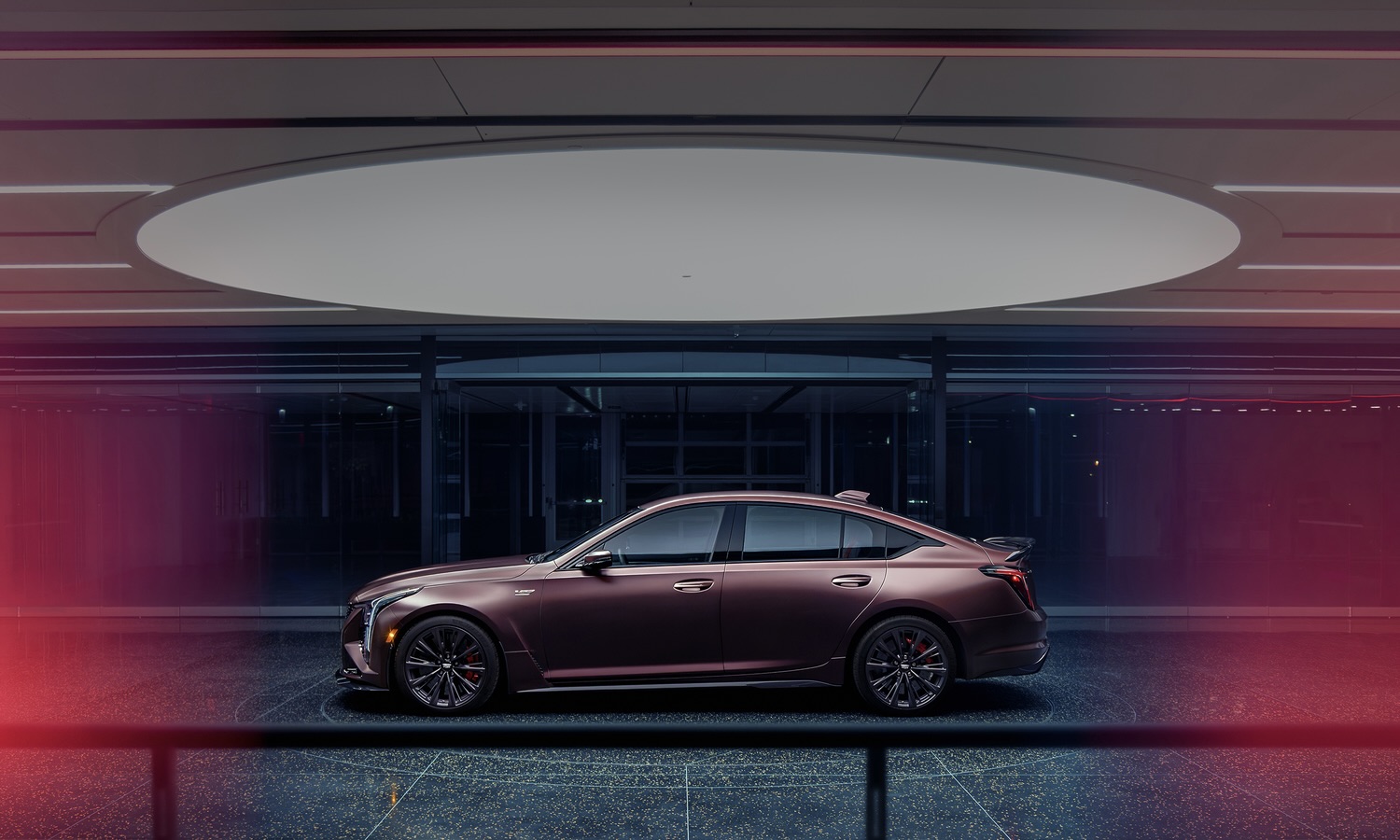 Side view of the Curated by Cadillac 2026 Cadillac CT5-V Blackwing in Deep Amethyst Metallic exterior paint color.