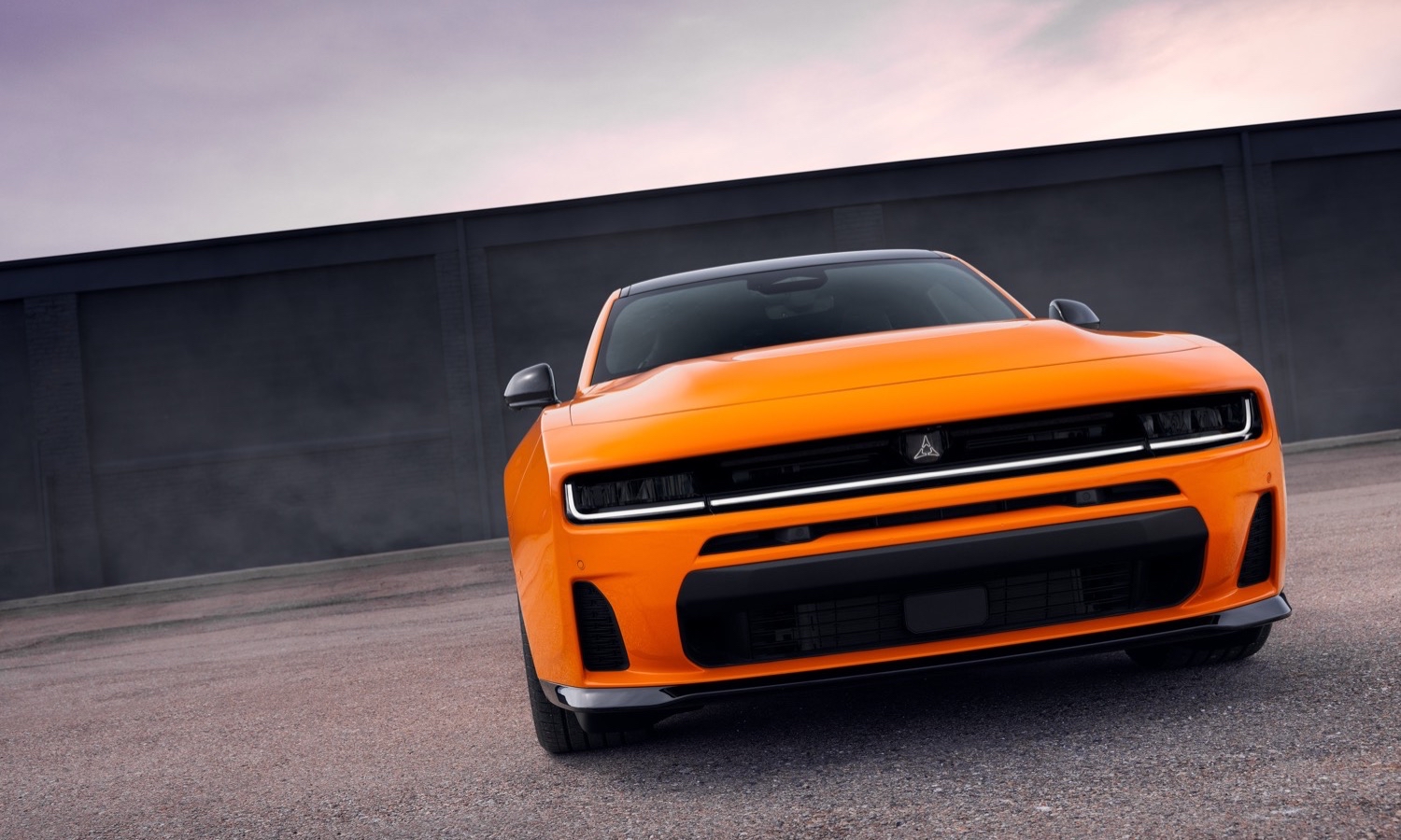 The front fascia is unique to SIXPACK-powered 2026 Dodge Charger models, with a larger, more pronounced grille area than all-electric Charger Daytona models.