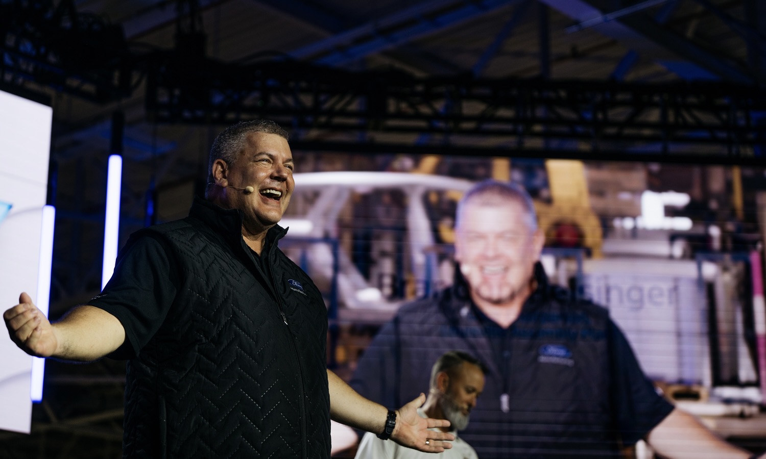Bryce Currie, Ford vice president, Americas Manufacturing speaks during Monday’s launch event to introduce the new Ford Universal EV Platform and Ford Universal EV Production System at Louisville Assembly Plant on August 11, 2025. Louisville Assembly Plant will assemble the platform’s first vehicle – a midsize four-door electric pickup.