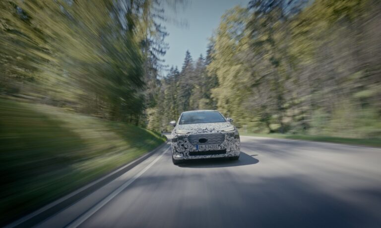 Audi A2 e-tron in camouflage wrap, dynamic photo