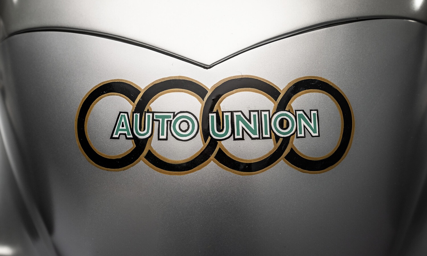 Audi recreated the Auto Union Lucca. After just over three years of construction, the record-breaking car was completed in early 2026. Detail: the Auto Union logo as used on the Auto Union racing cars of the 1930s.
