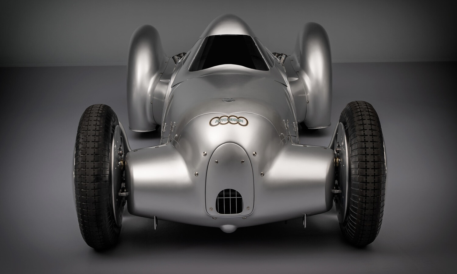 Audi recreated the Auto Union Lucca. After just over three years of construction, the record-breaking car was completed in early 2026. Studio shot. Front view.